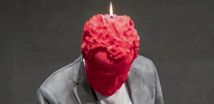 A statue of a man made from candle wax.
