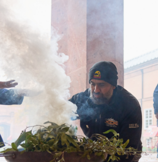 Saxon State Minister for Cultural and Tourism Barbara Klepsch participating in smoking ceremony with community representatives Lindsay Munro and David Feeney at the Grassi Museum