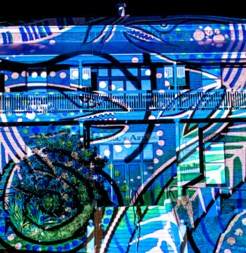 Earth Base Productions Projection art on the Gympie Regional Gallery heritage building by Earth Base Productions, featuring designs by Gubbi Gubbi artist Lyndon Davis.