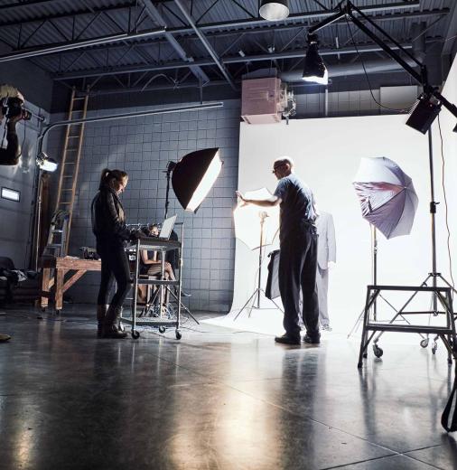 Film crew work on a set.