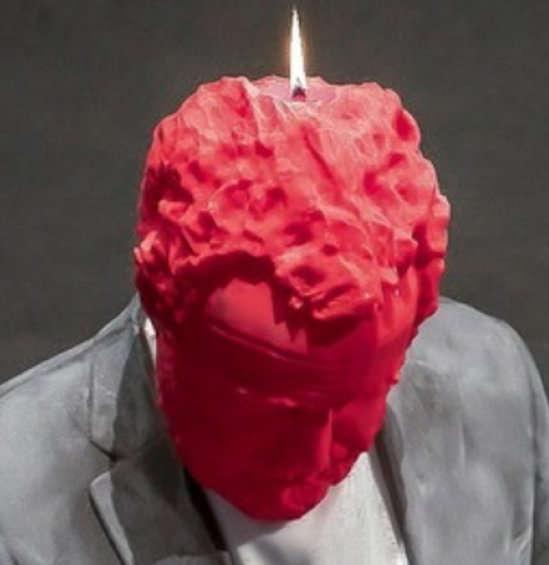 A statue of a man made from candle wax.