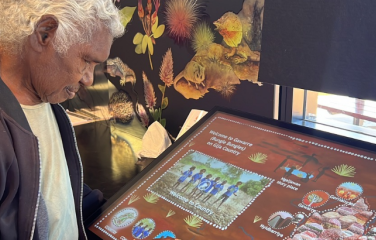 Senior Custodian Shirley Drill with the Jirraginy joo Goorrarndal – Frog and Brolga interactive display panel at Purnululu National Park. Credit: SharingStories 